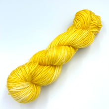 Load image into Gallery viewer, Skein of superwash merino yarn hand dyed in a yellow color
